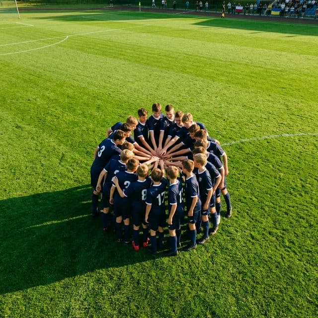 SOFC Academy team huddle — aerial view